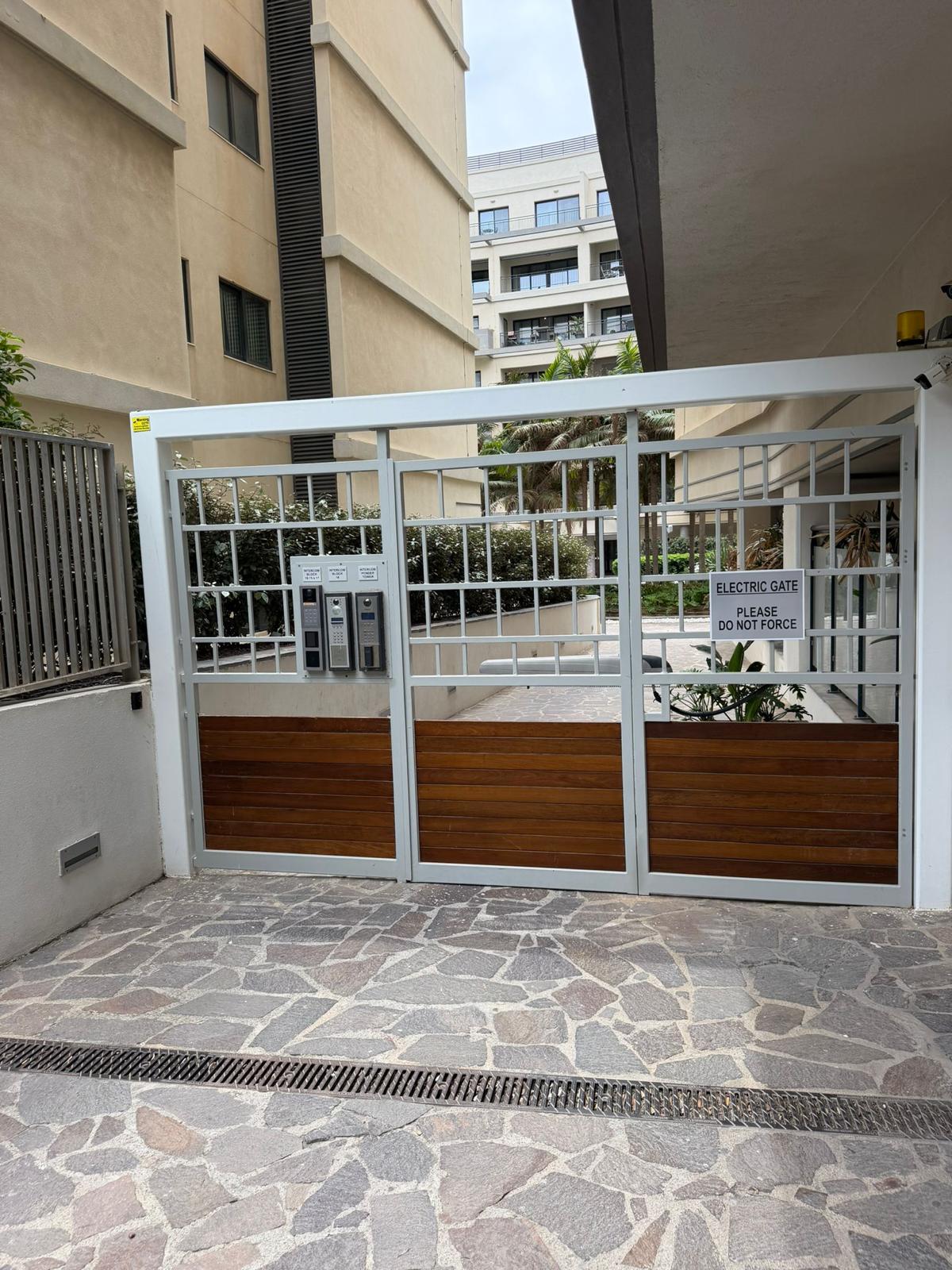 Electric gate to the residential complex